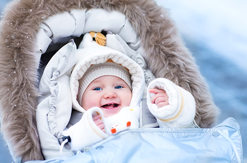 Equiper sa poussette pour le froid et la pluie