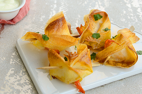 Croustilles de crevettes et de mangue à la crème de curry et de gingembre